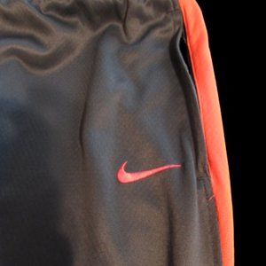 Nike Dri-Fit Joggers, Grey with Orange Swoosh. Women's size Medium, front pocket